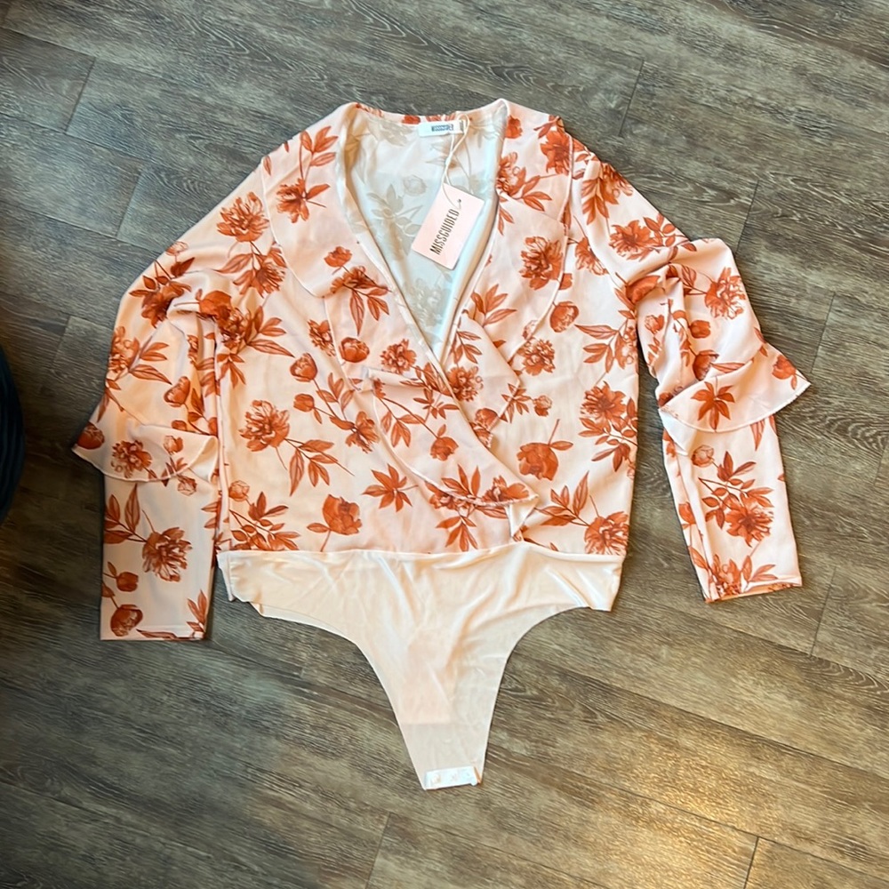 NWT plunge bodysuit